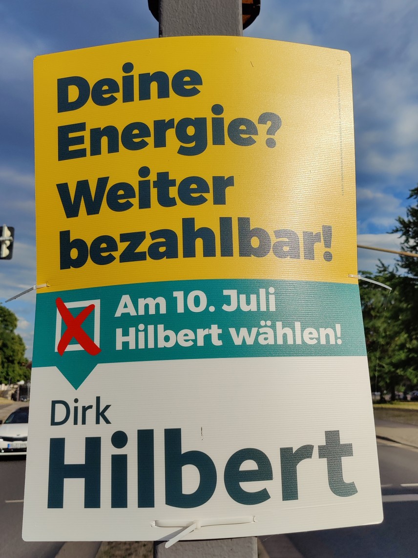 Themenplakat Deine Energie? Weiter bezahlbar! Am 10. Juli Hilbert wählen!