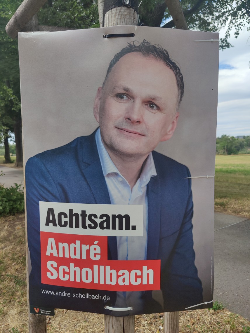 Kandidierendenplakat Achtsam. André Schollbach