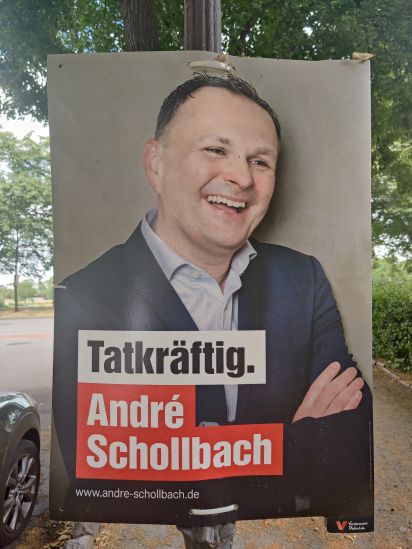 Kandidierendenplakat Tatkräftig. André Schollbach